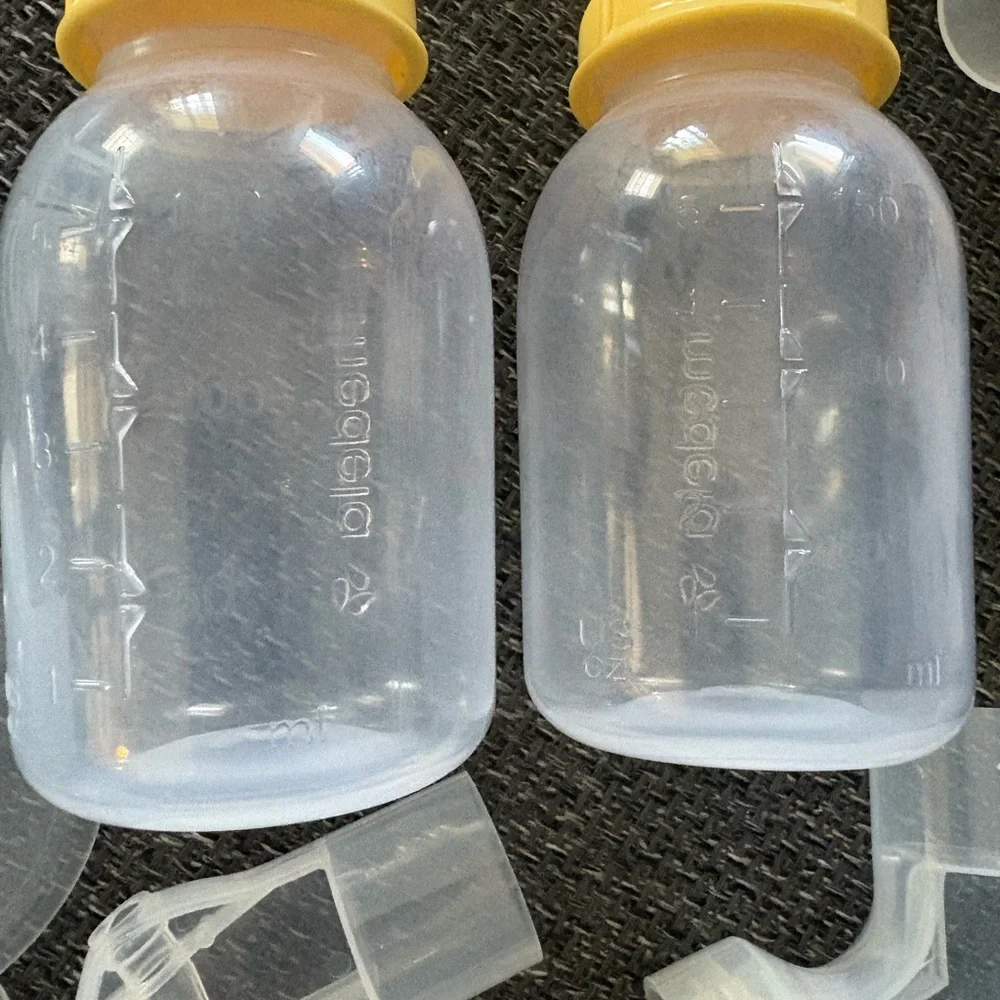 Medela Clear Breast Milk Bottles and Yellow Lid Pump Accessories